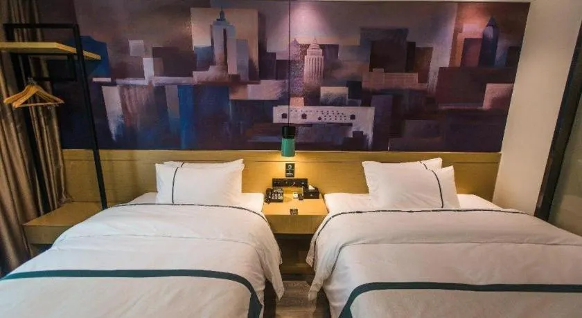 Bed in City Comfort Inn Shaoguan High-speed Railway Station Xilian Examination Center