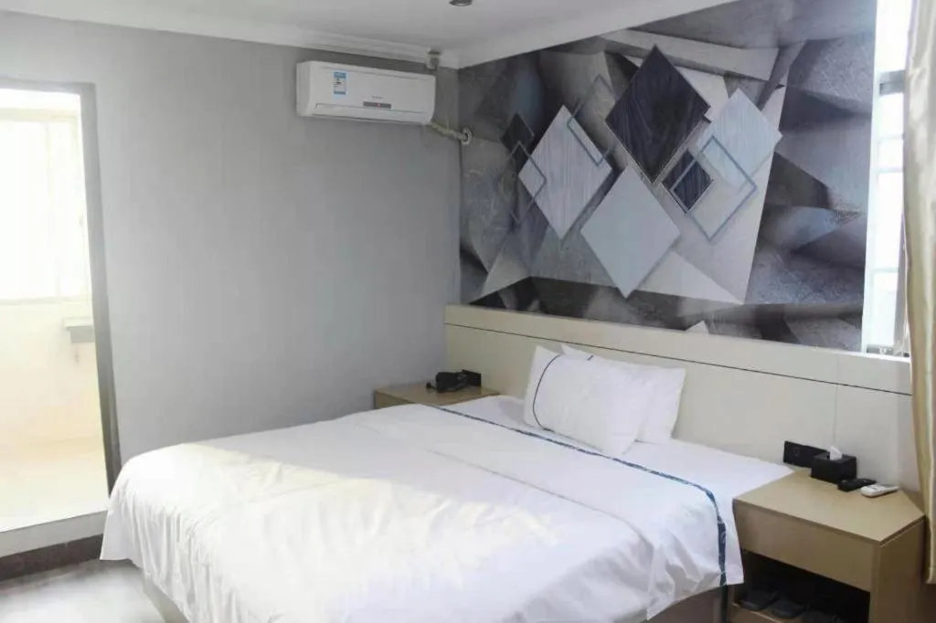 Bed in City Comfort Inn Shaoguan High-speed Railway Station Xilian Examination Center