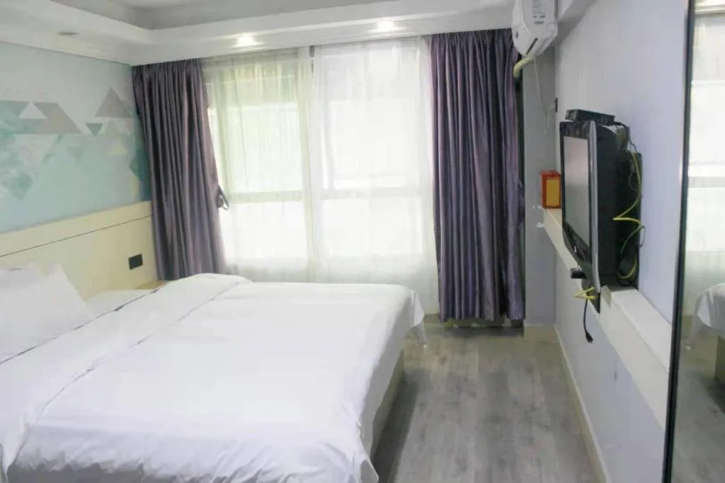 Bed in City Comfort Inn Shaoguan High-speed Railway Station Xilian Examination Center