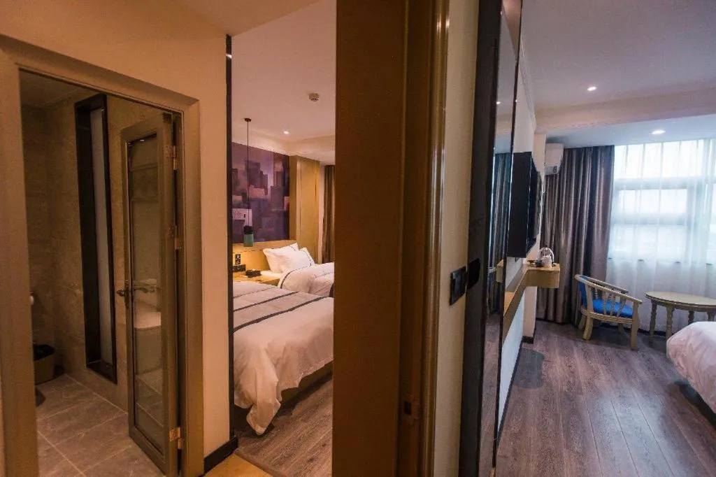 Bed in City Comfort Inn Shaoguan High-speed Railway Station Xilian Examination Center