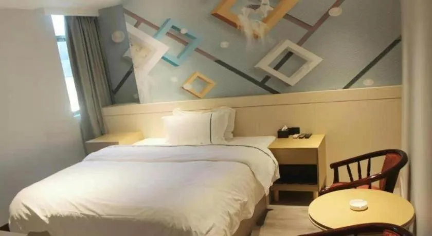 Bed in City Comfort Inn Shaoguan High-speed Railway Station Xilian Examination Center