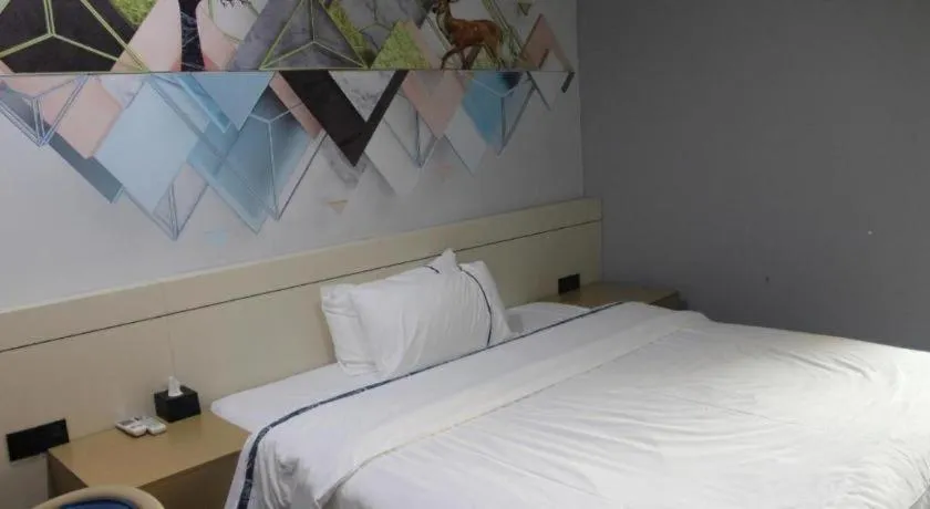 Bed in City Comfort Inn Shaoguan High-speed Railway Station Xilian Examination Center