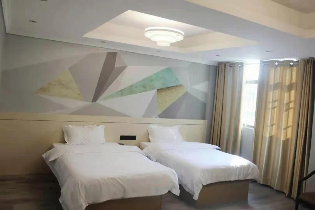 Bed in City Comfort Inn Shaoguan High-speed Railway Station Xilian Examination Center