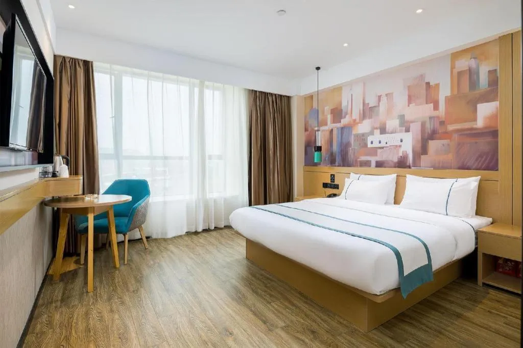Bed in City Comfort Inn Taizhou Wanda Plaza