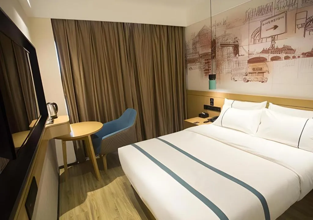 Bed in City Comfort Inn Taizhou Wanda Plaza