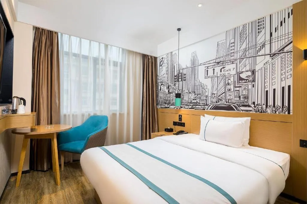 Bed in City Comfort Inn Taizhou Wanda Plaza