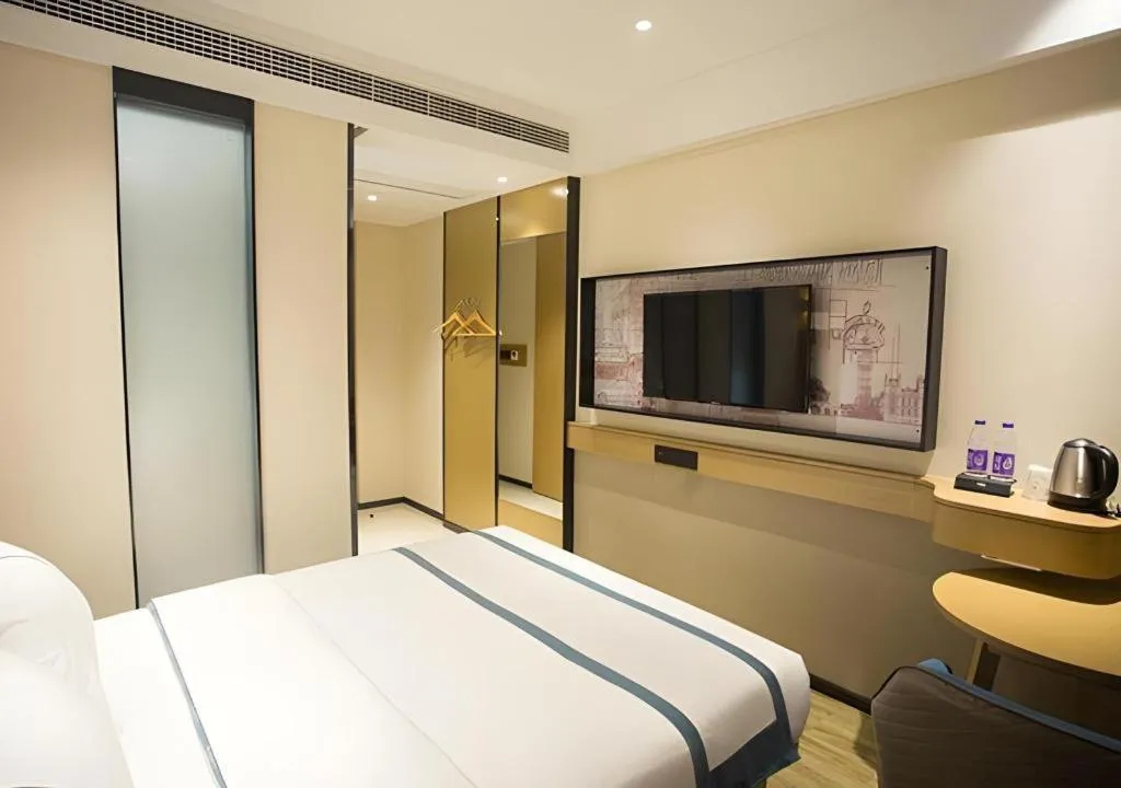 Bed in City Comfort Inn Taizhou Wanda Plaza
