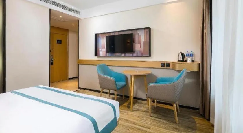 Bed in City Comfort Inn Taizhou Wanda Plaza