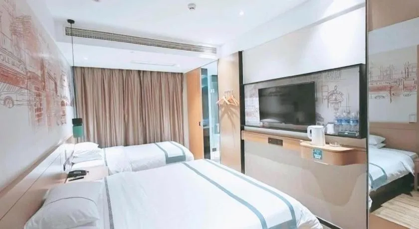 Bed in City Comfort Inn Taizhou Wanda Plaza