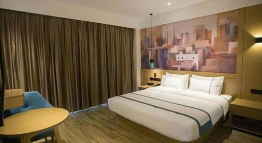 Bed in City Comfort Inn Taizhou Wanda Plaza