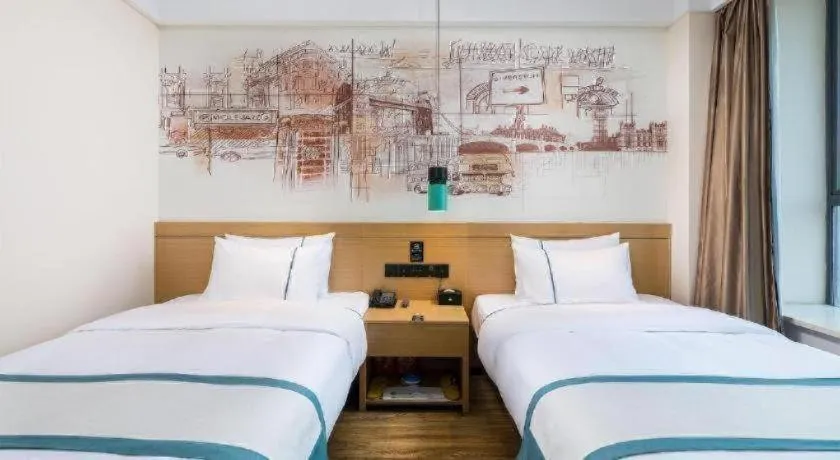 Bed in City Comfort Inn Taizhou Wanda Plaza