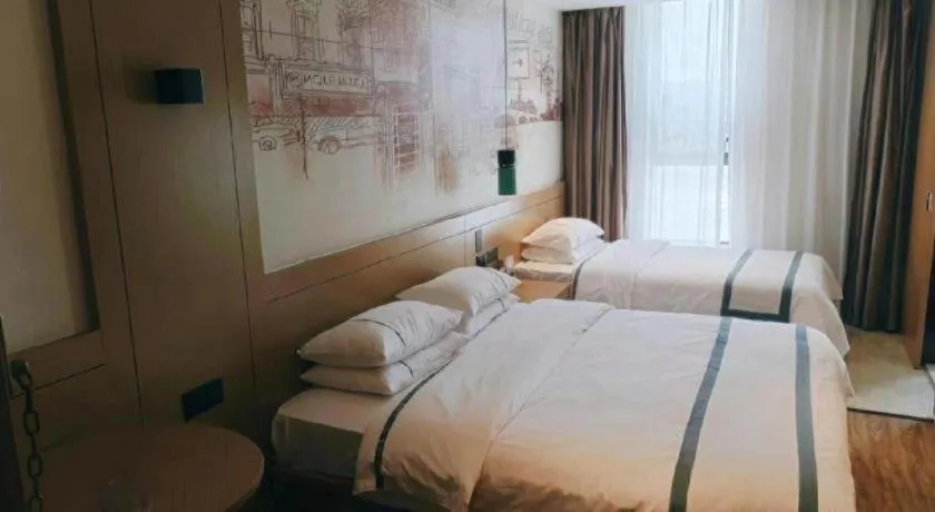 Bed in City Comfort Inn Taizhou Wanda Plaza