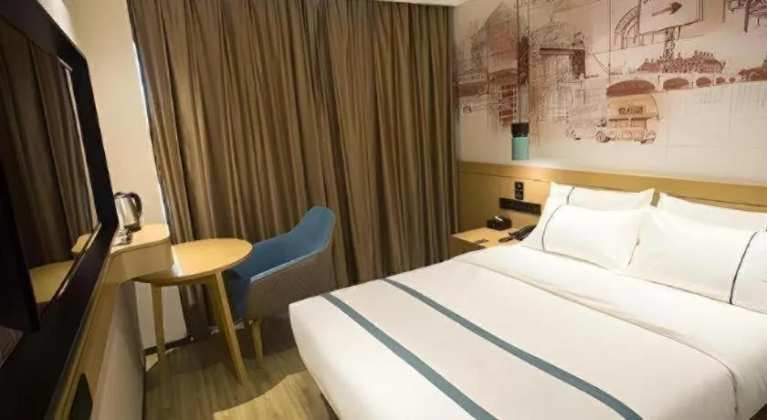 Bed in City Comfort Inn Taizhou Wanda Plaza