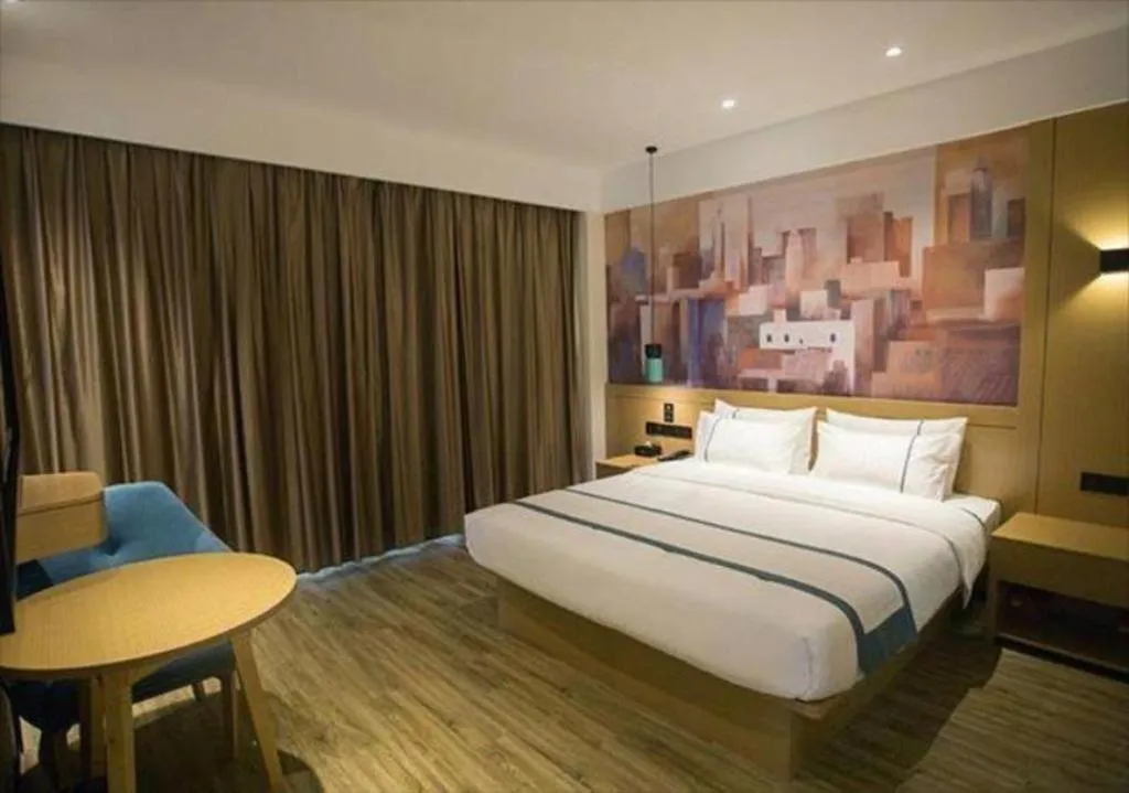 Bed in City Comfort Inn Taizhou Wanda Plaza