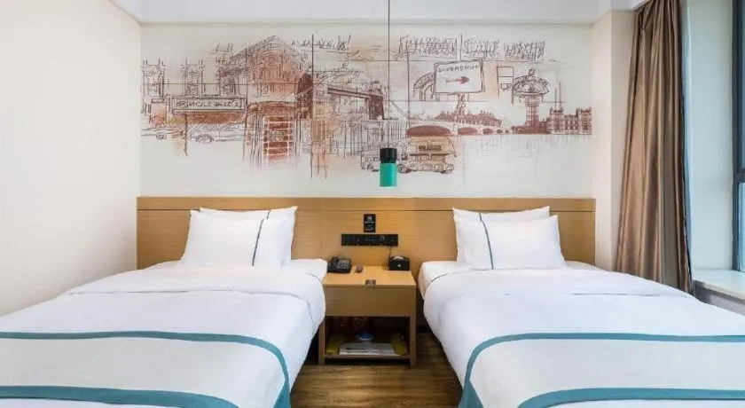 Bed in City Comfort Inn Taizhou Wanda Plaza