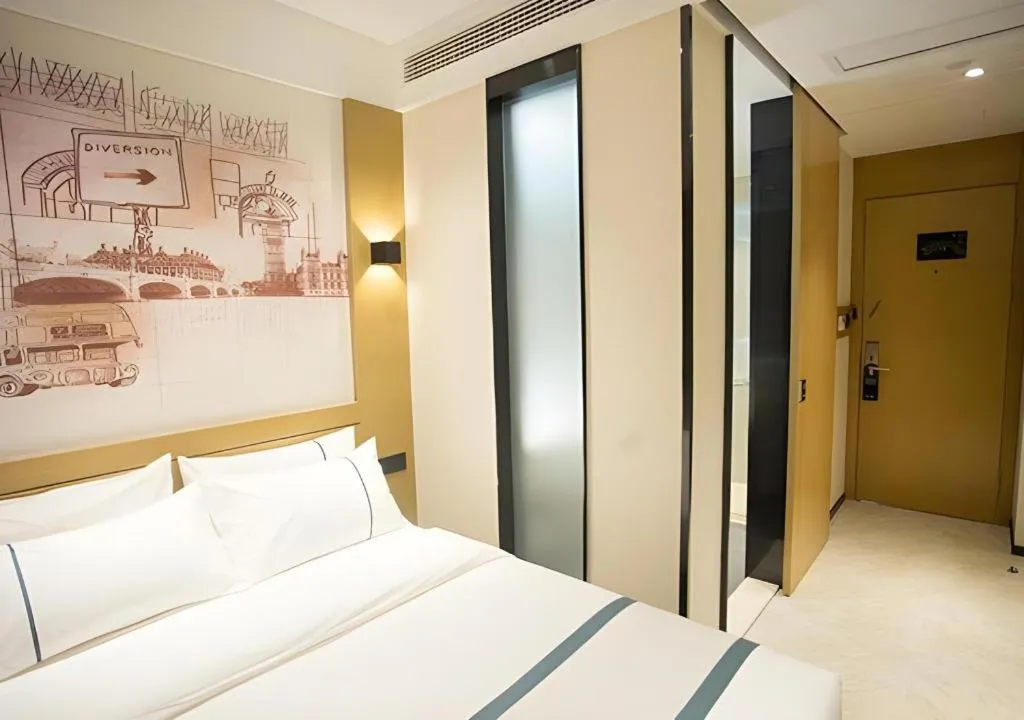 Bed in City Comfort Inn Taizhou Wanda Plaza