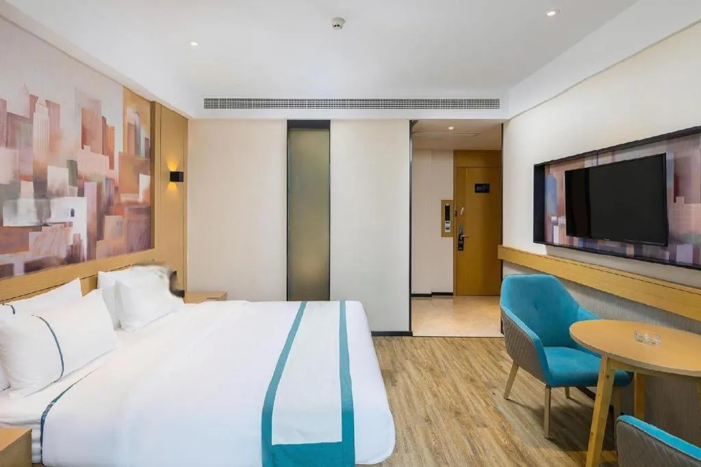 Bed in City Comfort Inn Taizhou Wanda Plaza