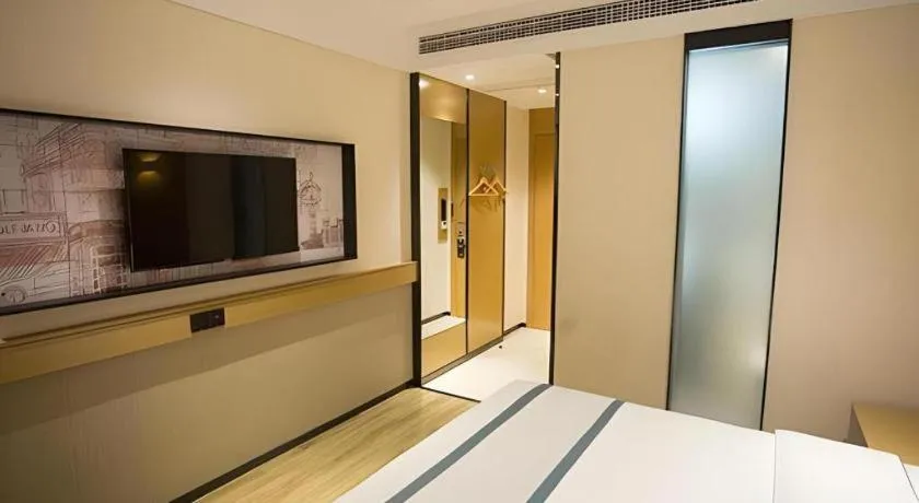 Bed in City Comfort Inn Taizhou Wanda Plaza