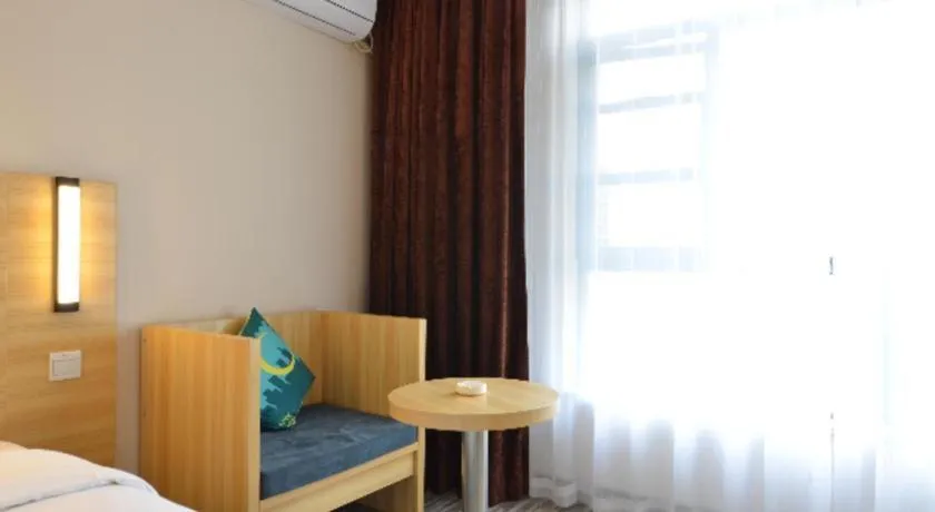 Bed in City Comfort Inn Huanggang Qichun Exhibition Center