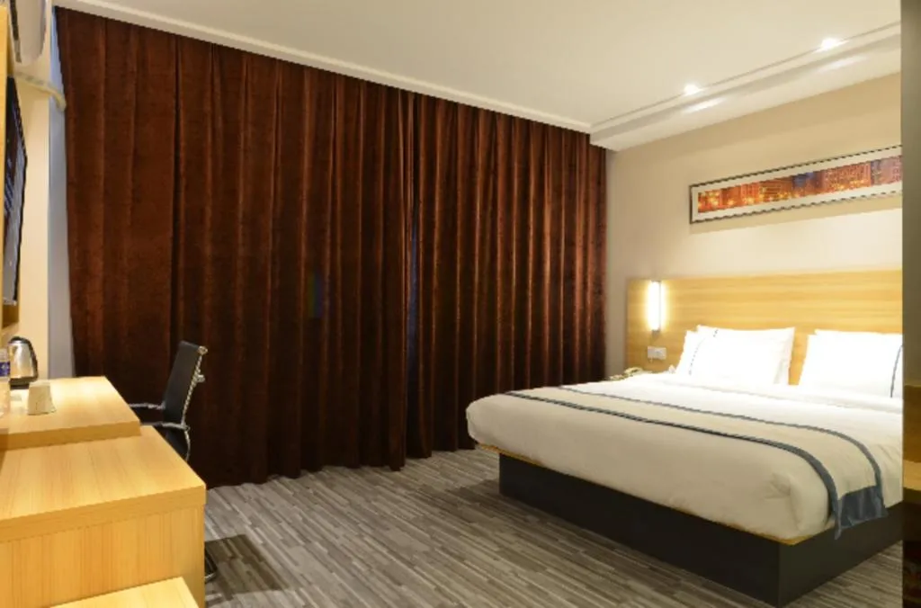 Bed in City Comfort Inn Huanggang Qichun Exhibition Center