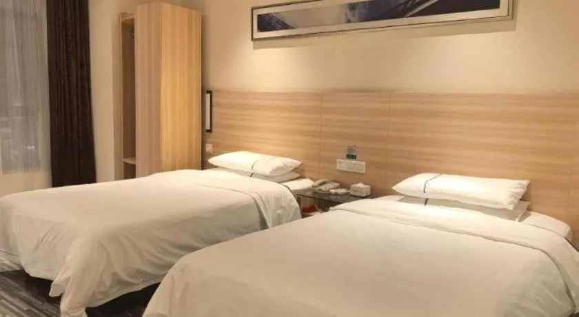 Bed in City Comfort Inn Huanggang Qichun Exhibition Center