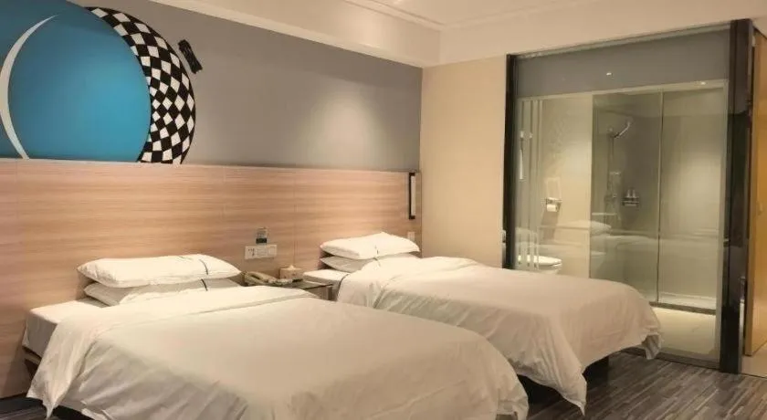 Bed in City Comfort Inn Huanggang Qichun Exhibition Center