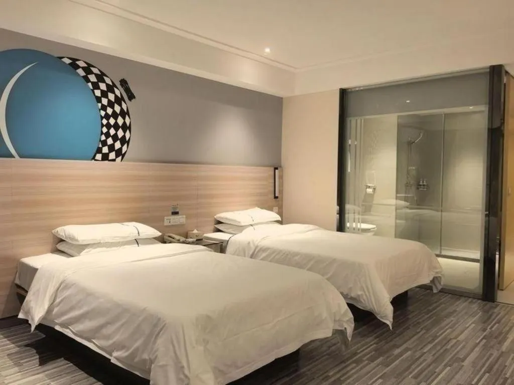 Bed in City Comfort Inn Huanggang Qichun Exhibition Center