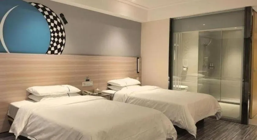 Bed in City Comfort Inn Huanggang Qichun Exhibition Center