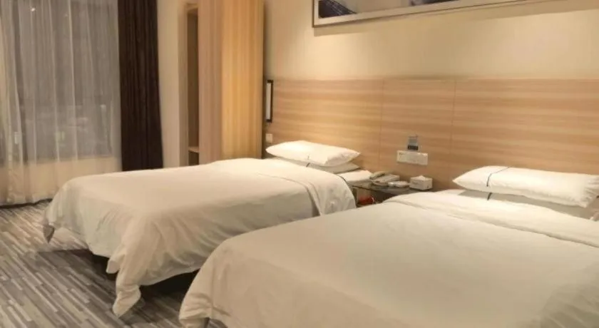 Bed in City Comfort Inn Huanggang Qichun Exhibition Center