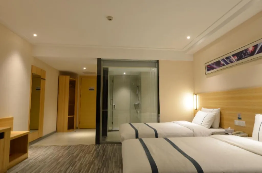 Bed in City Comfort Inn Huanggang Qichun Exhibition Center