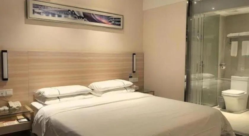 Bed in City Comfort Inn Huanggang Qichun Exhibition Center