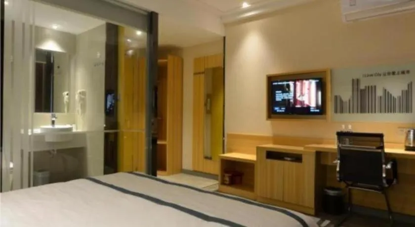 Bed in City Comfort Inn Huanggang Qichun Exhibition Center