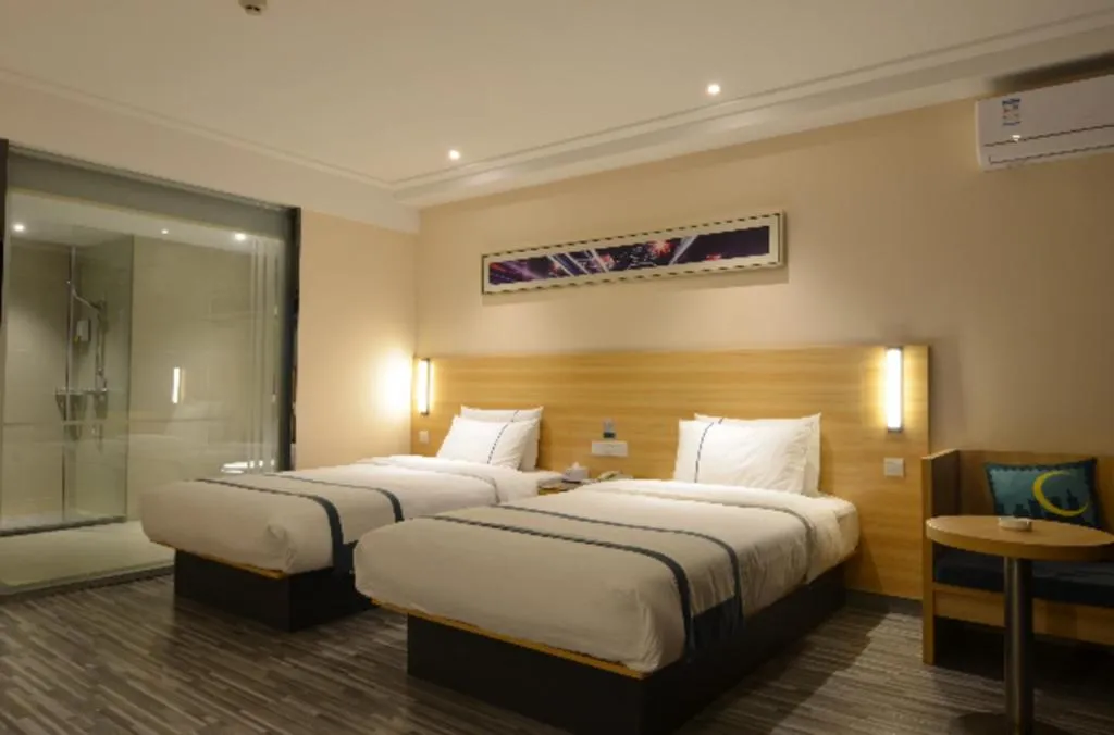 Bed in City Comfort Inn Huanggang Qichun Exhibition Center