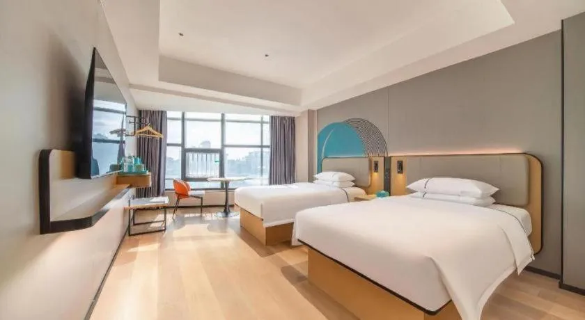 Bed in City Comfort Inn Zhanjiang Mazhang Pedestrian Street High-speed Railway West Station