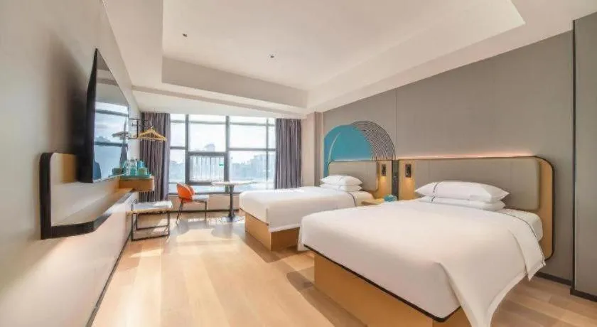 Bed in City Comfort Inn Zhanjiang Mazhang Pedestrian Street High-speed Railway West Station