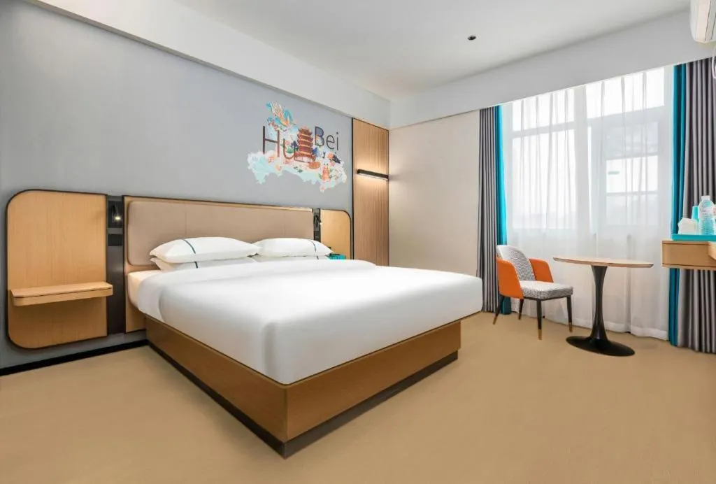 Bed in City Comfort Inn Wuhan International Expo Center Qianjin Village Metro Station