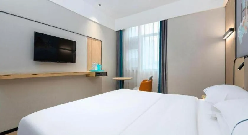 Bed in City Comfort Inn Wuhan International Expo Center Qianjin Village Metro Station