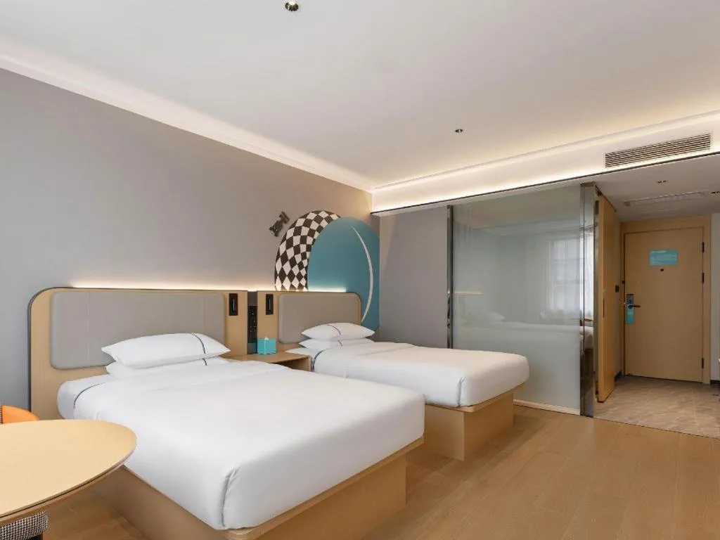 Bed in City Comfort Inn Wuhan International Expo Center Qianjin Village Metro Station