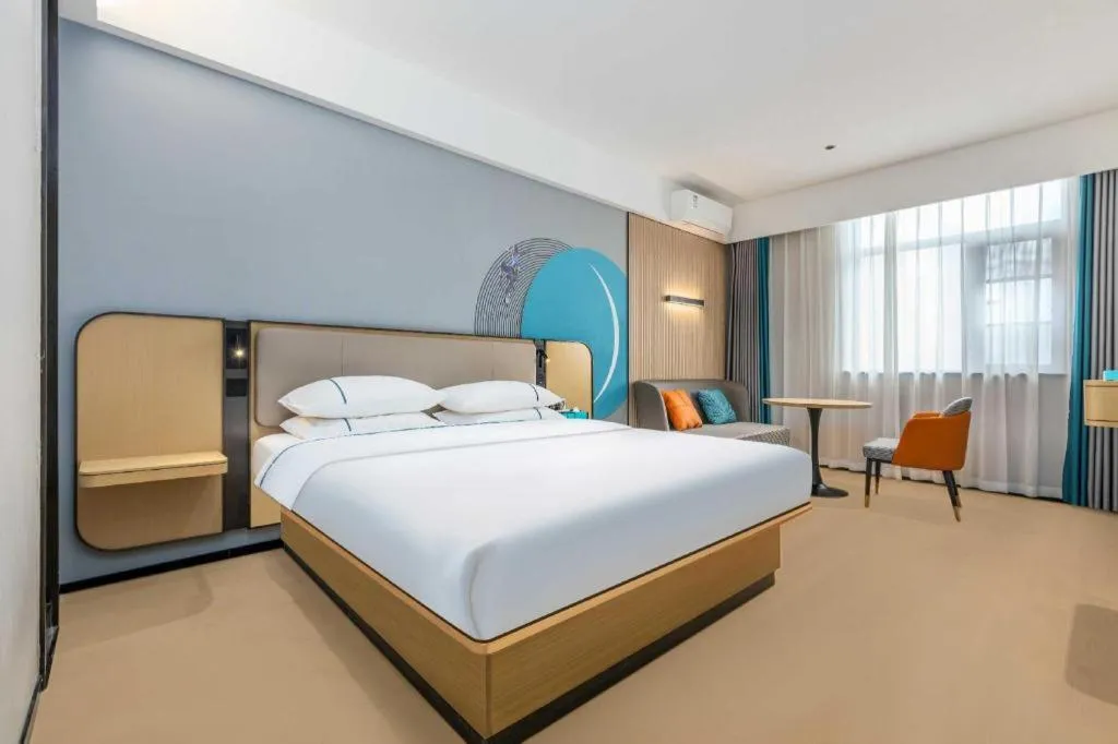 Bed in City Comfort Inn Wuhan International Expo Center Qianjin Village Metro Station