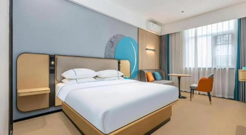 Bed in City Comfort Inn Wuhan International Expo Center Qianjin Village Metro Station