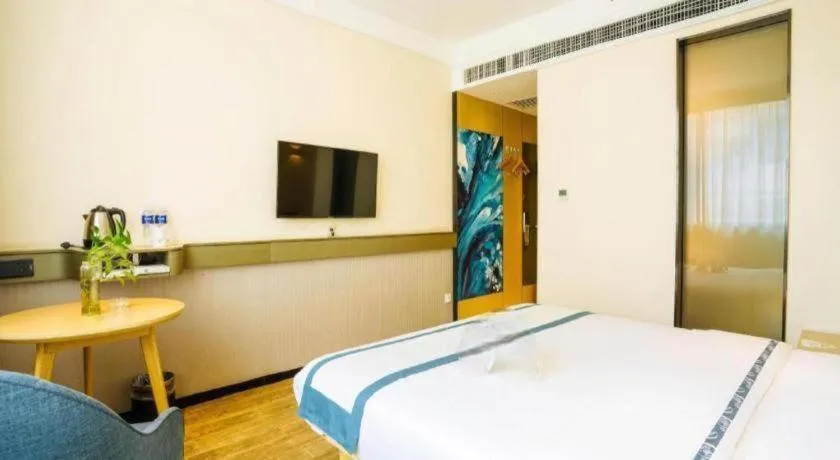 Bed in City Comfort Inn Wuhan International Expo Center Qianjin Village Metro Station