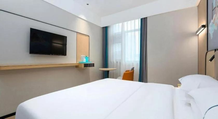 Bed in City Comfort Inn Wuhan International Expo Center Qianjin Village Metro Station