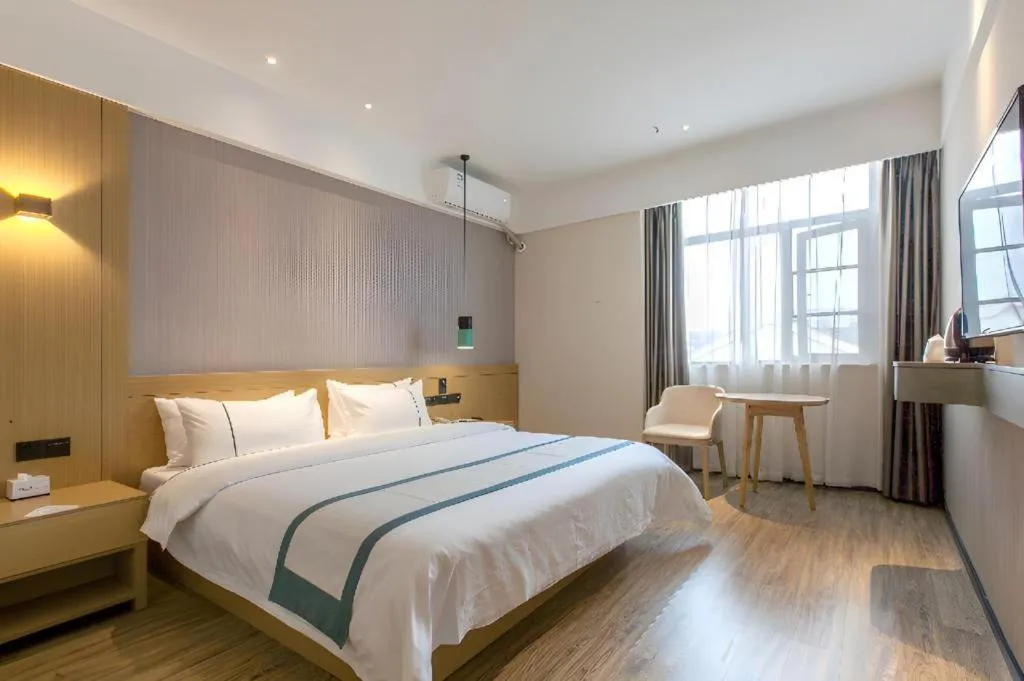 Bed in City Comfort Inn Wuhan International Expo Center Qianjin Village Metro Station