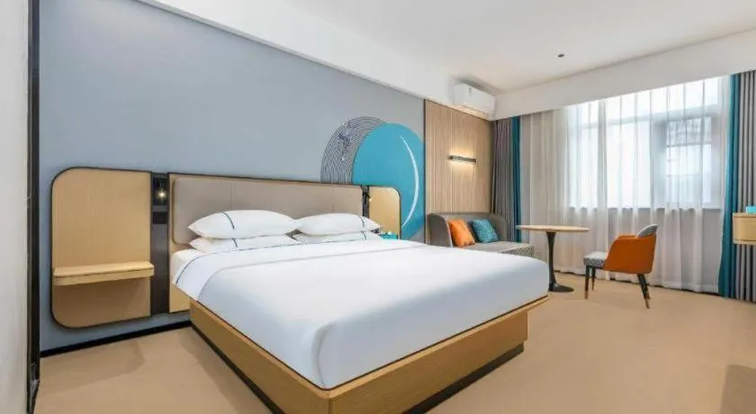 Bed in City Comfort Inn Wuhan International Expo Center Qianjin Village Metro Station