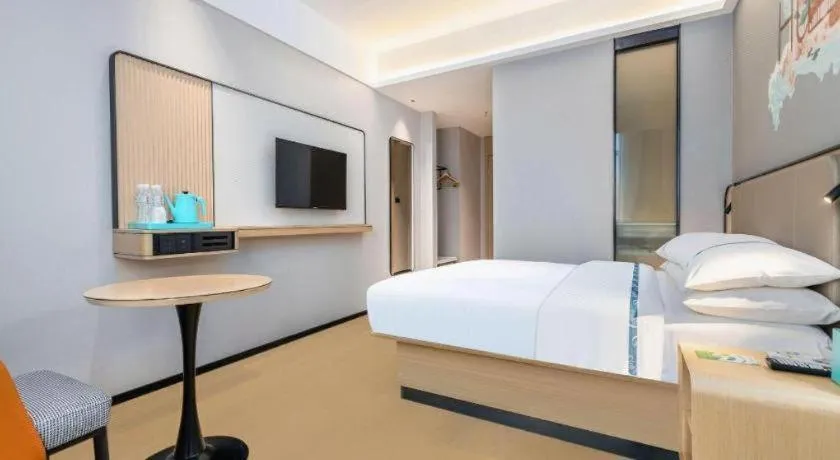 Bed in City Comfort Inn Wuhan International Expo Center Qianjin Village Metro Station