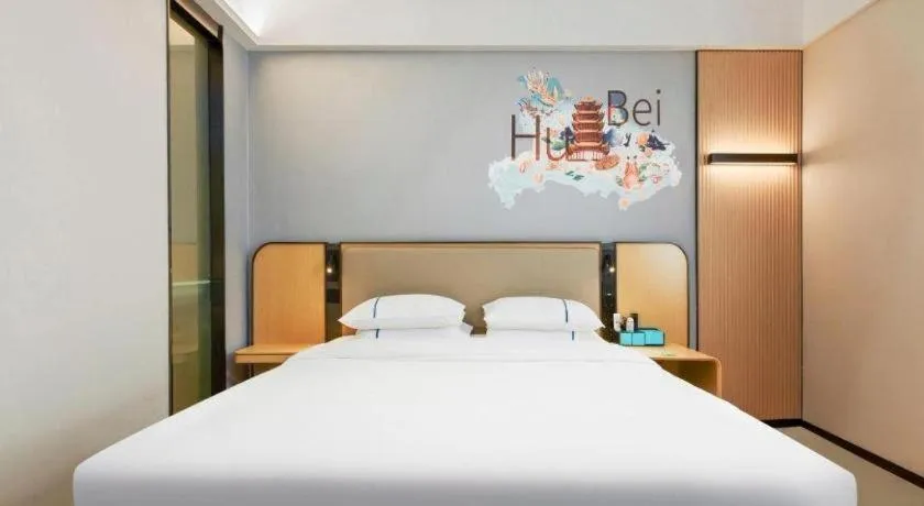 Bed in City Comfort Inn Wuhan International Expo Center Qianjin Village Metro Station
