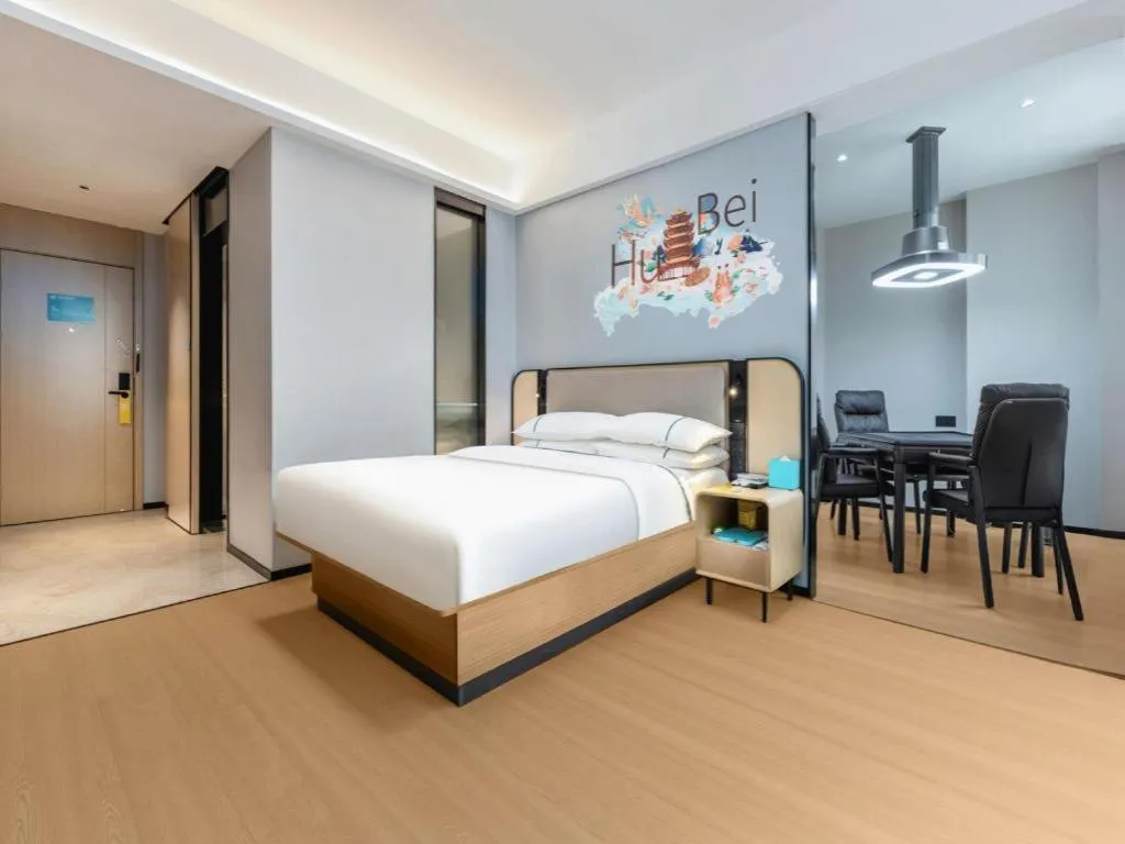 Bed in City Comfort Inn Wuhan International Expo Center Qianjin Village Metro Station