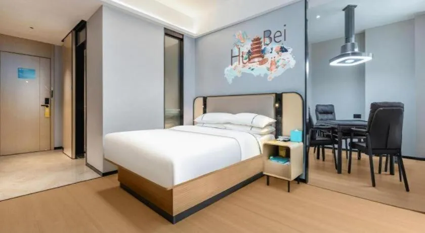 Bed in City Comfort Inn Wuhan International Expo Center Qianjin Village Metro Station