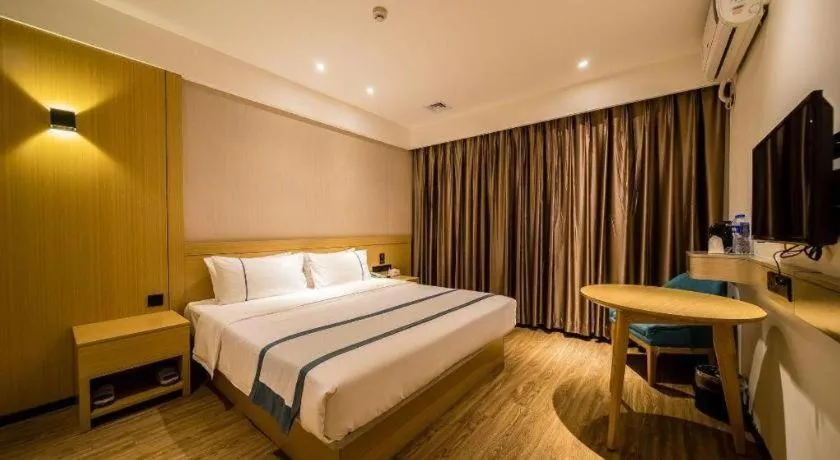 Bed in City Comfort Inn Wuhan International Expo Center Qianjin Village Metro Station