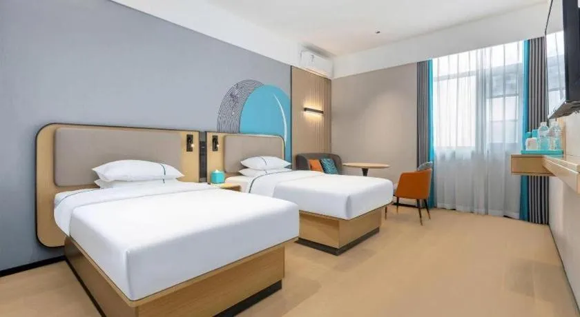 Bed in City Comfort Inn Wuhan International Expo Center Qianjin Village Metro Station